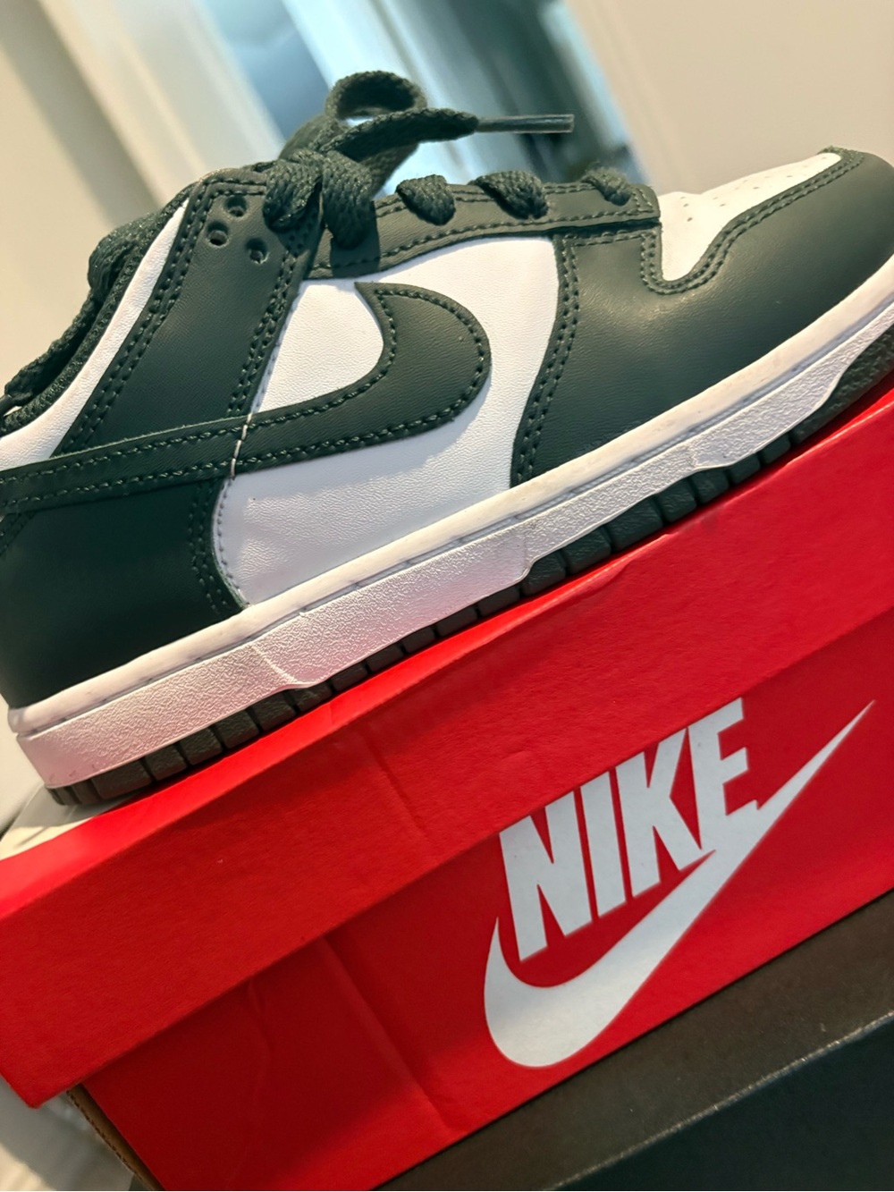 Nike Kids' Black and White Low-Top Sneakers with Grey Sole